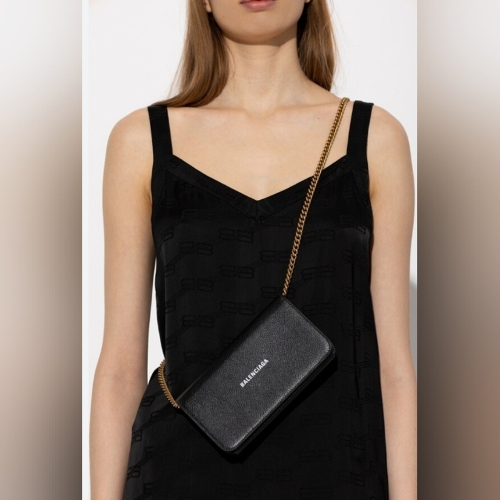Balenciaga cash leather chain wallet.